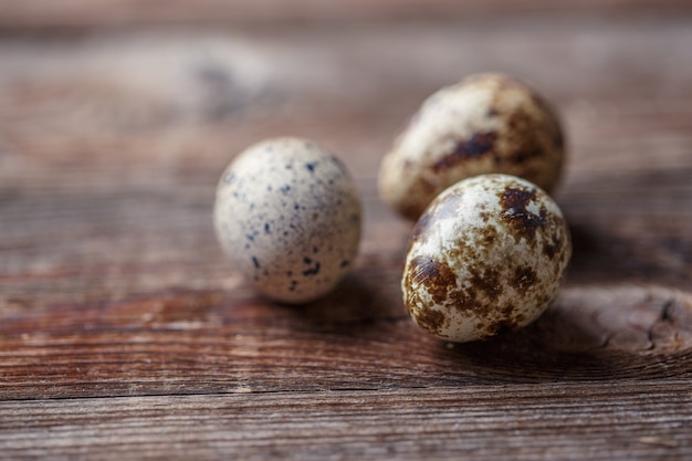 Group of quail eggs on thewooden background