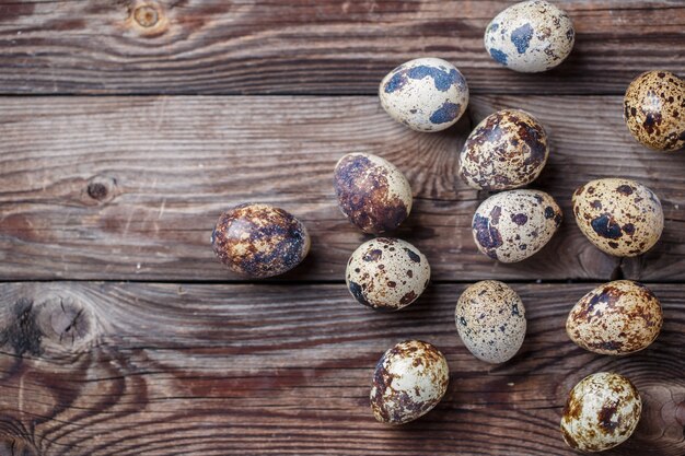 Group of quail eggs on thewooden background