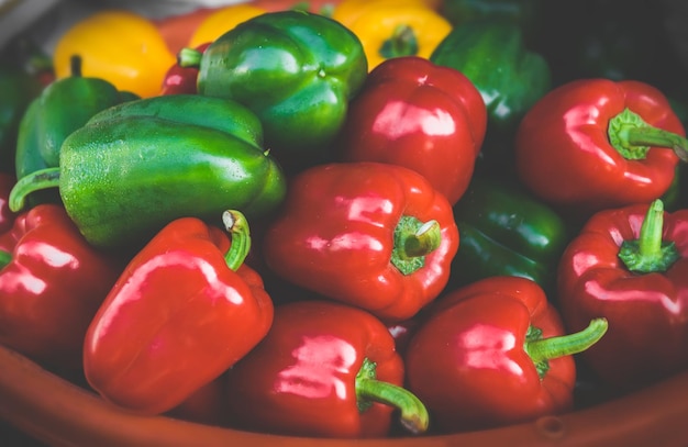 Group of red green and yellow bell peppers