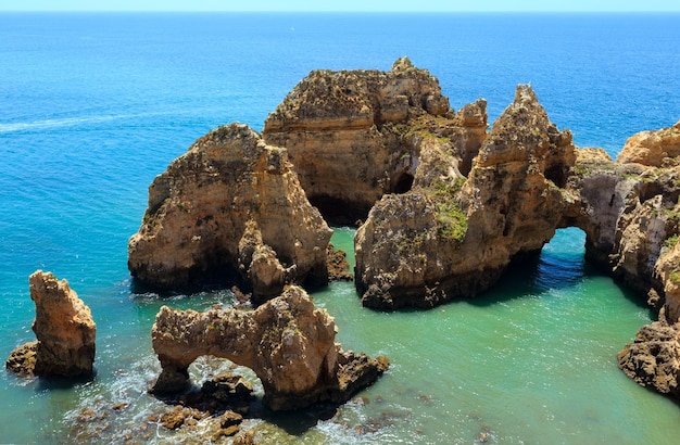 Group of rock formations along coastline of Lagos town, Ponta da Piedade, Algarve, Portugal.