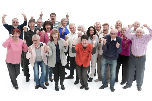 Group of senior people raising their hands celebrating a victory