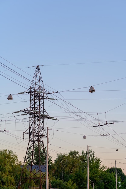 Group silhouette of transmission towers power tower electricity pylon steel lattice tower at twilight in US