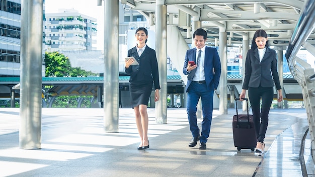 group smart business people of man and woman walk together in feeling happy at the outdoor 