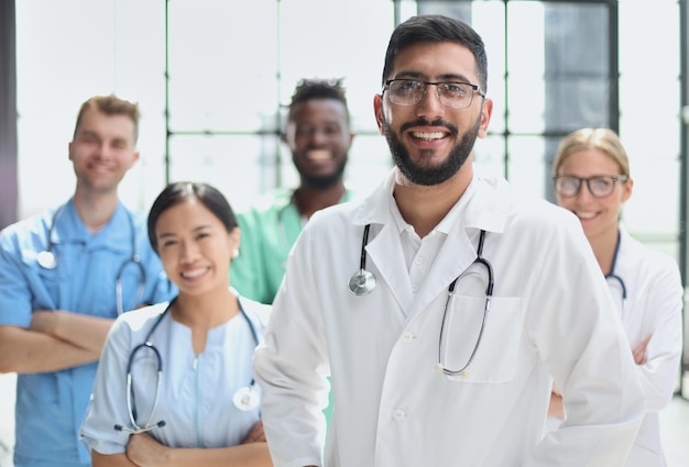 Group of specialists in white overalls at advanced training courses