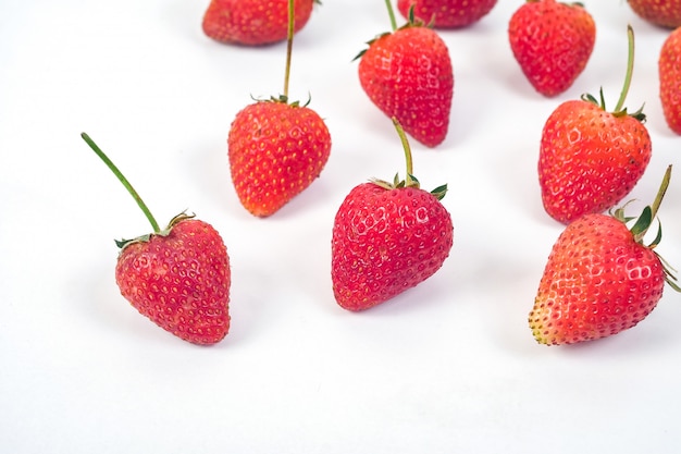 Group of Strawberries on white background.