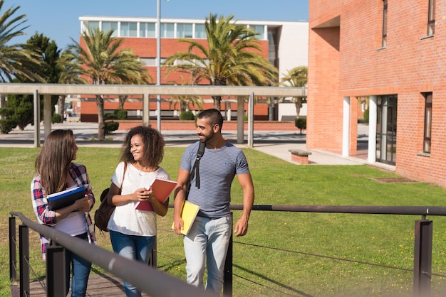 Group of students sitting on school campus