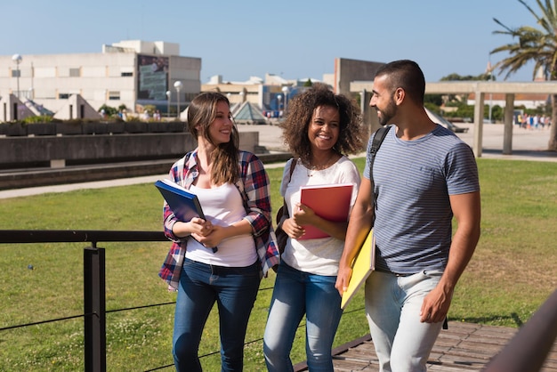 Group of students walking on school campus