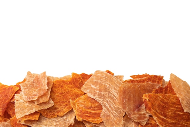 A group of tasty beer snacks. Dehydrated chicken meat slices.