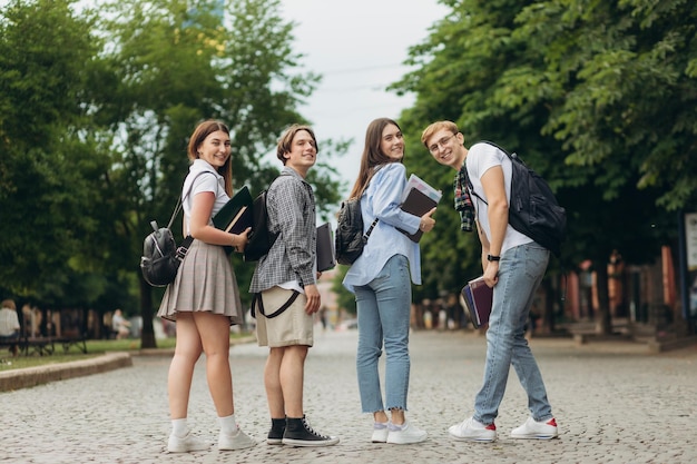 Group of teenage students standing outdoors