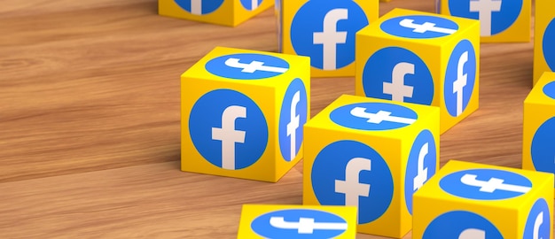 A group of yellow and blue cubes with facebook on them