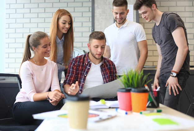 Group of young business people and designers.They working on new project.Startup concept.