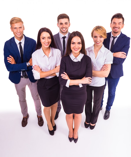 A group of young business people smiling.