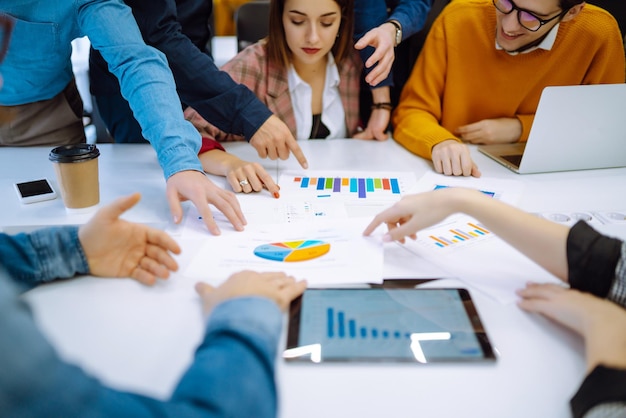 Group of young businesspeople working together in office Planning analysis work in teamwork