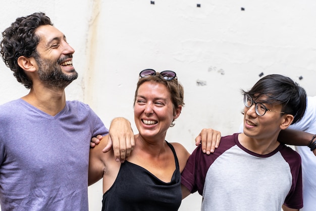 Group of young people of different ethnicities smiling together