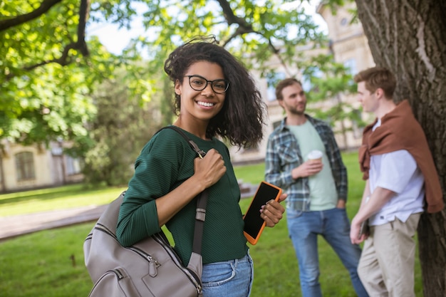 A group of young people spending time together in the park