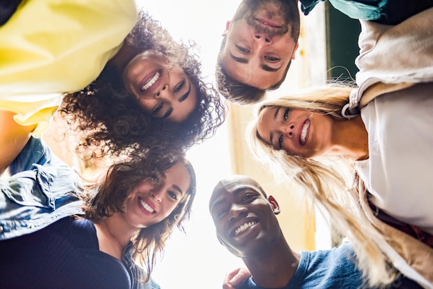 Group of young people together outdoors in urban background