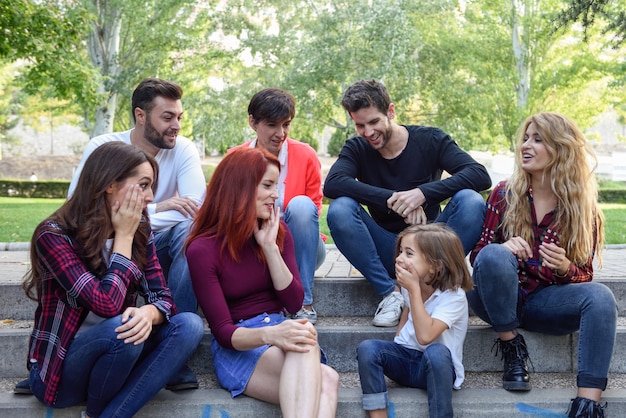 Group of young people together outdoors in urban background