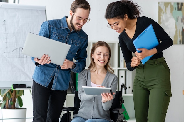 Group of young people working together at the office