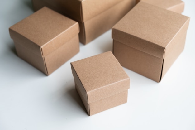 Grouping of cardboard boxes on white background