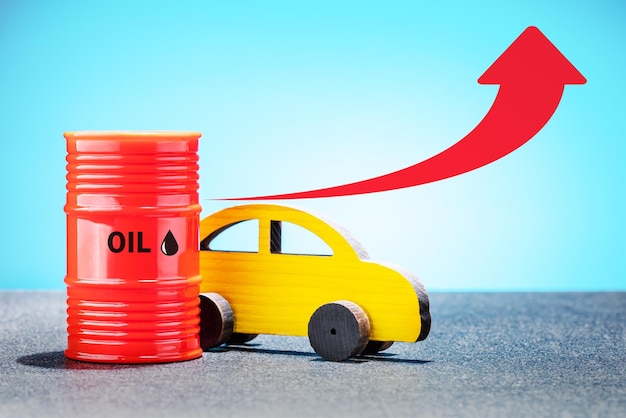 Grow of fuel prices Yellow auto red oil barrel with chart increase of fuel price