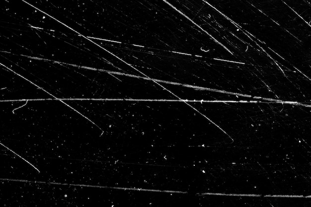 Grunge background with scratches on a black background