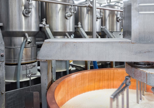 Gruyere de Comte Cheese Production at the dairy in Franche Comte, Burgundy, of France.