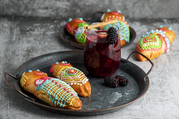 Guagua and colada morada for day of the dead, guagua de pan, wawas de pan, bread of the dead in Bolivia, Ecuador, Peru