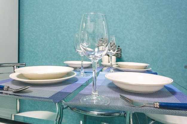 Guest table in Interior of the modern luxure kitchen in studio apartments in minimalistic style