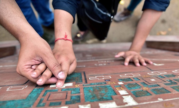 Guiding Hand on Tactile Map for the Visually Impaired