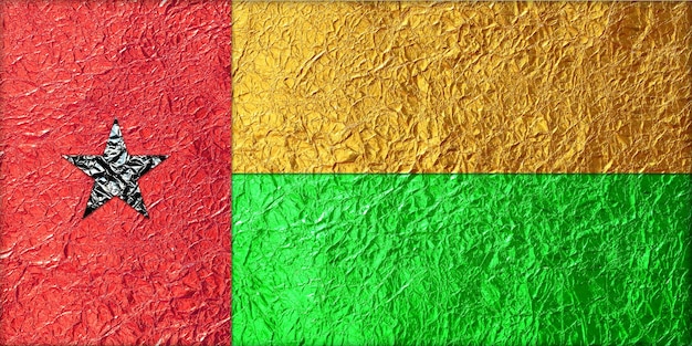 Guinea-Bissau Flag made form foil texture background