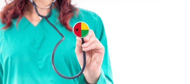 Guinea Bissau national healthcare system female doctor with stethoscope