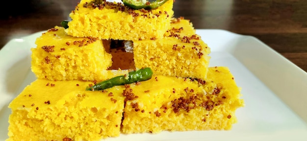 Gujarati Khaman Dhokla made using Chana Dal served with Green chutney selective focus