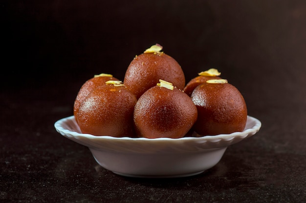 Gulab Jamun, Indian dessert topped with pistachio