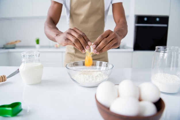 guy confectioner making fresh soft bread doughing flour eggs culinary in modern interior kitchen