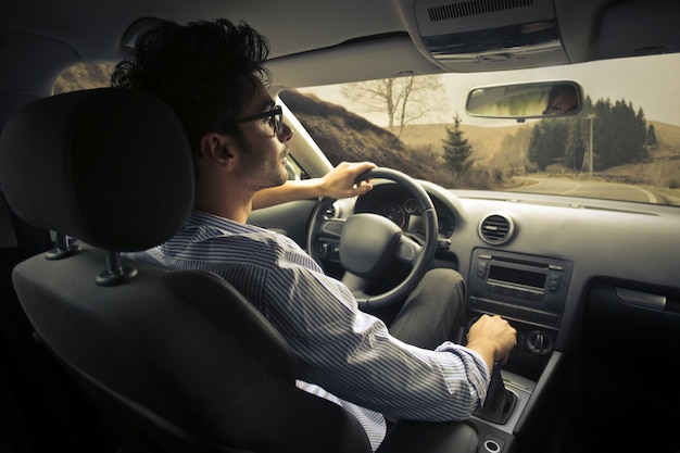 Guy driving a car