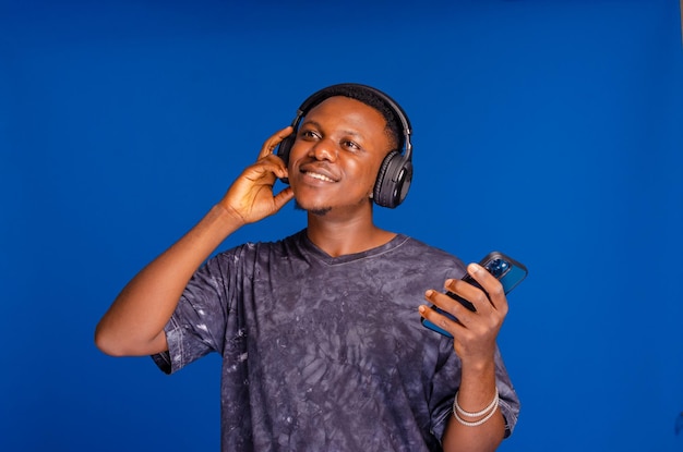 Guy enjoying the music he is listening on his headset