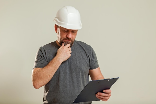 A guy looks through work documents