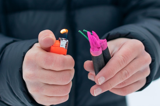 Guy Sets Fire to the Flash Noise Firecrackers Outdoors