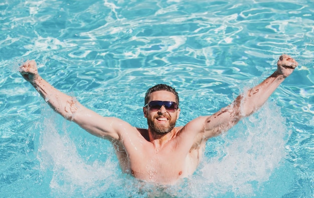 Guy in swimming pool water pool spa resort summertime vacation summer man