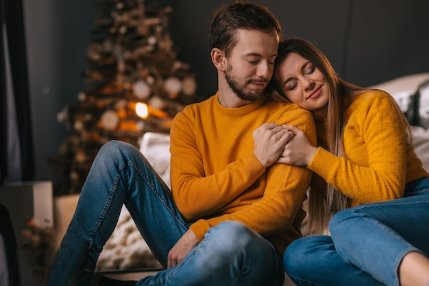 A guy with a girl is celebrating Christmas A loving couple enjoys each other on New Years Eve