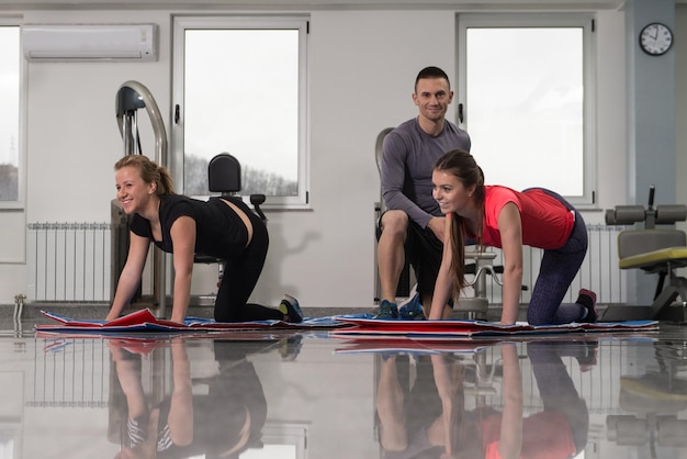 Gym People Stretching And Looking Very Happy