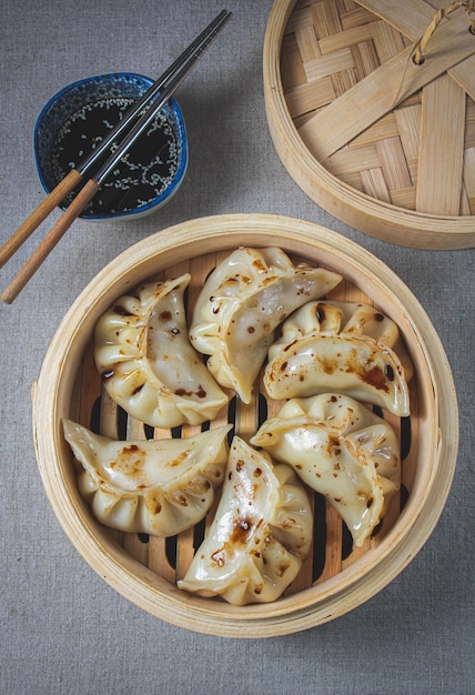 Gyoza Japanese korean dumplings on gray plate on the table top view