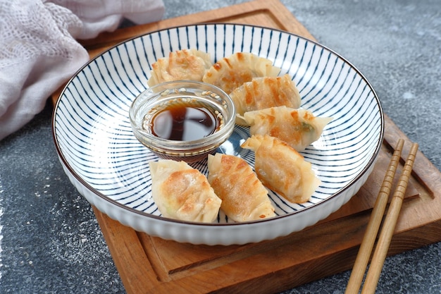 gyoza or Jiaozi or mandu, asian dumpling with Dipping Sauce