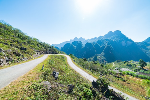 Ha Giang karst geopark mountain landscape in North Vietnam. Winding road in stunning scenery. Ha Giang motorbike loop