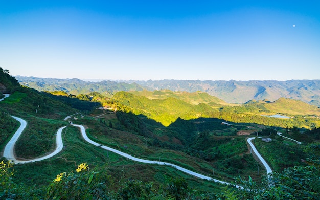 Ha Giang karst geopark mountain landscape in North Vietnam. Winding road in stunning scenery. Ha Giang motorbike loop