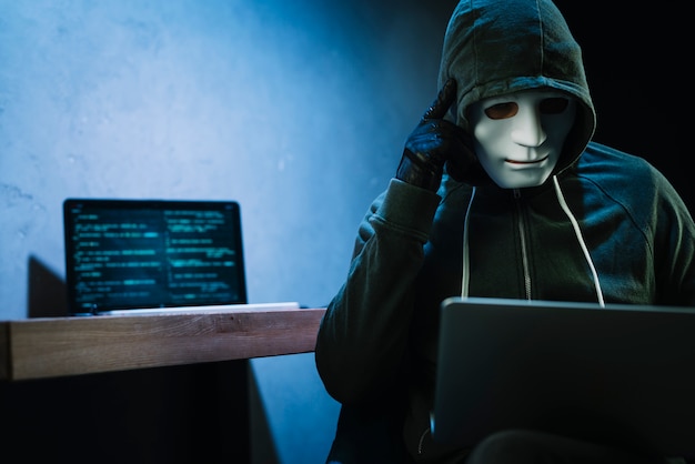 Hacker with laptop