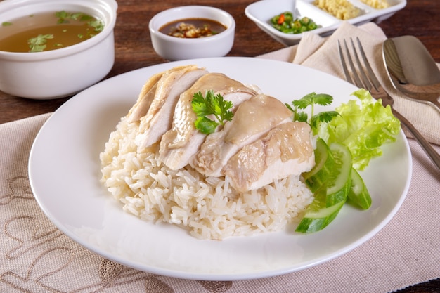 hainanese boiled chicken rice on the wooden table