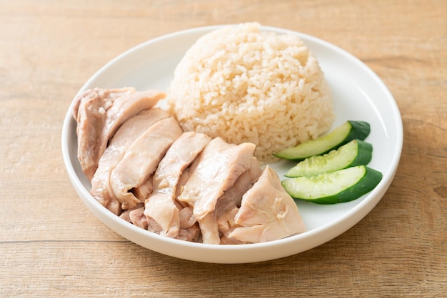 Hainanese chicken rice or rice steamed with chicken soup - Asian food style