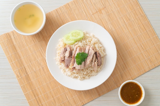 Hainanese Chicken Rice or steamed rice with chicken - Asian food style