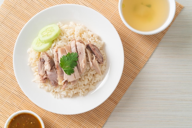 Hainanese Chicken Rice or steamed rice with chicken - Asian food style